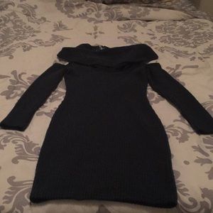 A dark green shirt/dress sweater